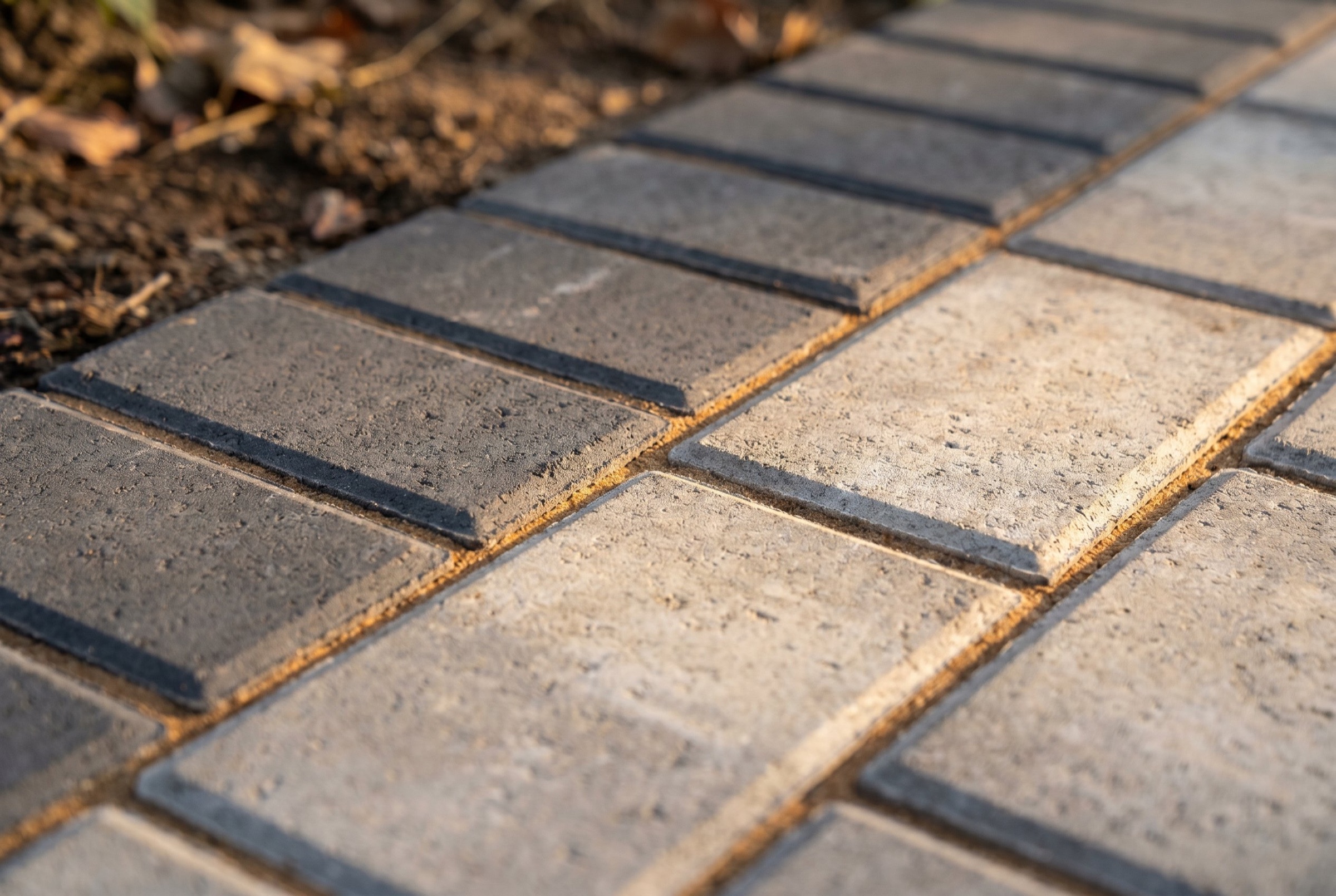 Close-up of precision paver craftsmanship and tight joint lines by Nostalgic Paver Systems